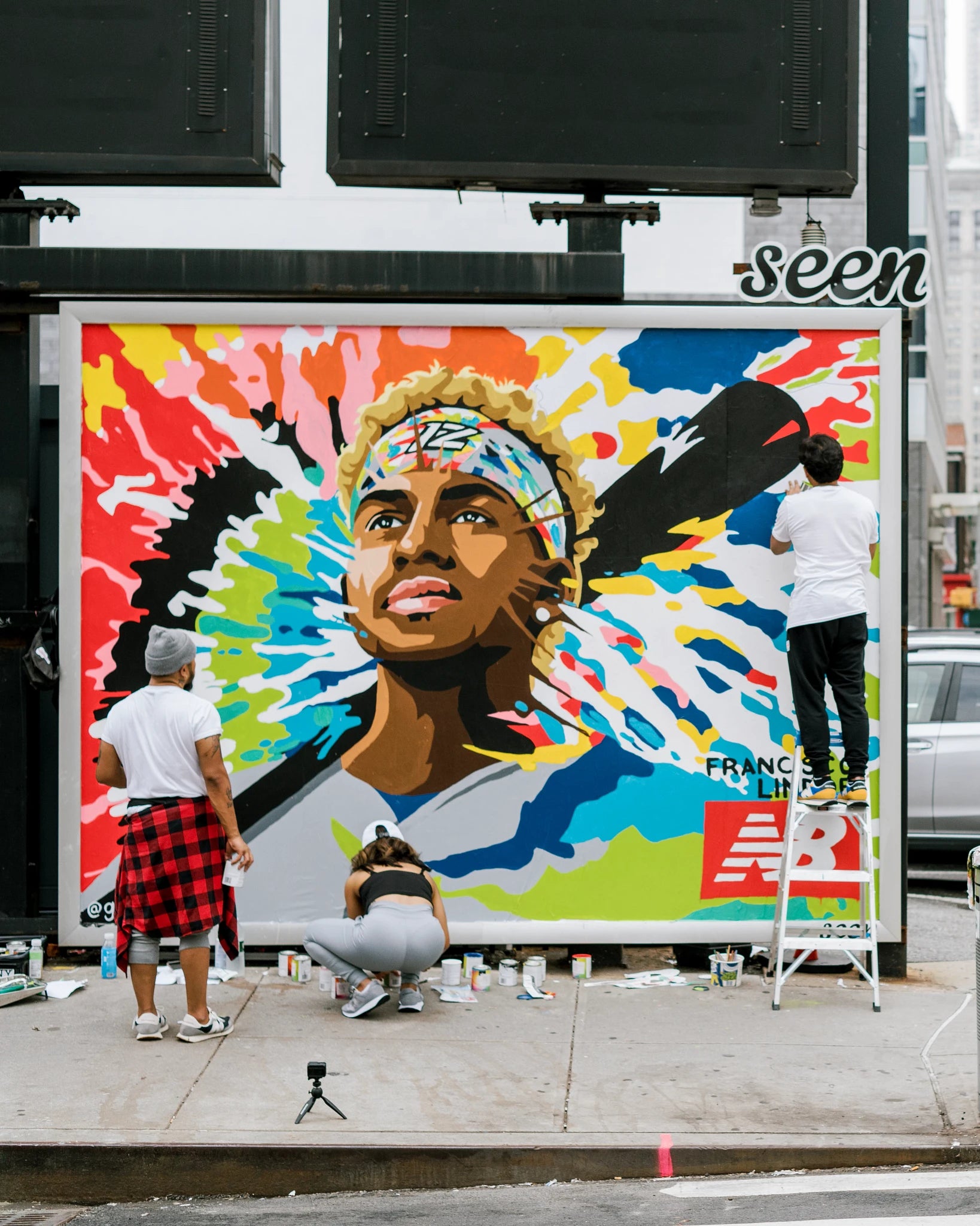 Paige/Doby/Robinson (2022) mural by Glen Infante